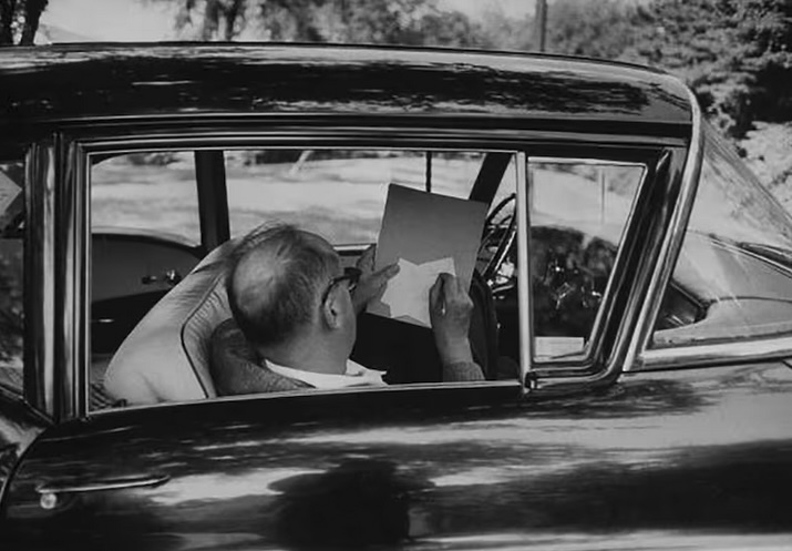 Vladimir Nabokov writing in the car_by Carl Mydans_wildculture.com