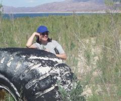 Stephanie Mills and tire, journal of wild culture
