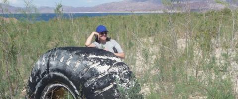 Stephanie Mills and tire, journal of wild culture
